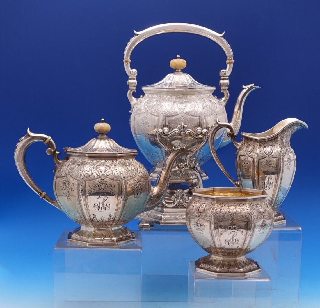 Durgin New Queens Sterling Silver 4pc Tea Set Monogrammed: Durgin New Queens Sterling Silver 4pc Tea Set Monogrammed This exquisite 4-piece tea set from Durgin features the elegant New Queens pattern, crafted from high-quality sterling silver. The set include