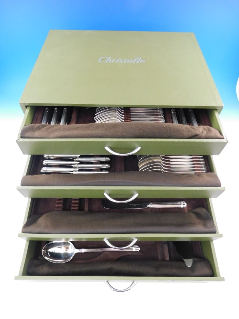 Christofle Aria Sterling Silver Flatware Set 100 pcs Art Deco France: Christofle Aria Sterling Silver Flatware Set 100 pcs Art Deco France Elevate your dining experience with this exquisite Aria sterling silver flatware set by Christofle, crafted in France. This impress