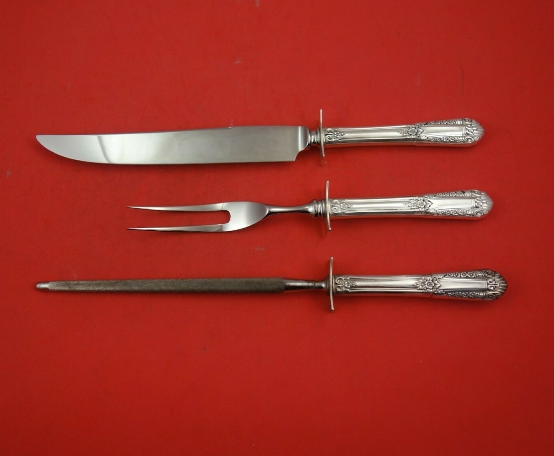 Inaugural State House Sterling Silver 3pc Steak Carving Set: Inaugural State House Sterling Silver 3pc Steak Carving Set Elevate your dining experience with the Inaugural by State House Sterling Silver Steak Carving Set. This exquisite 3-piece set features a cl