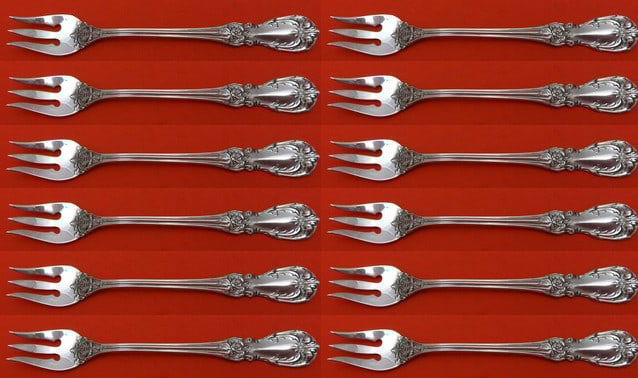 Reed and Barton Burgundy Sterling Silver Cocktail Fork Set 12 Pieces: Reed and Barton Burgundy Sterling Silver Cocktail Fork Set 12 Pieces Elevate your dining experience with this exquisite 12-piece cocktail fork set in the elegant Burgundy pattern by Reed & Barton. Eac