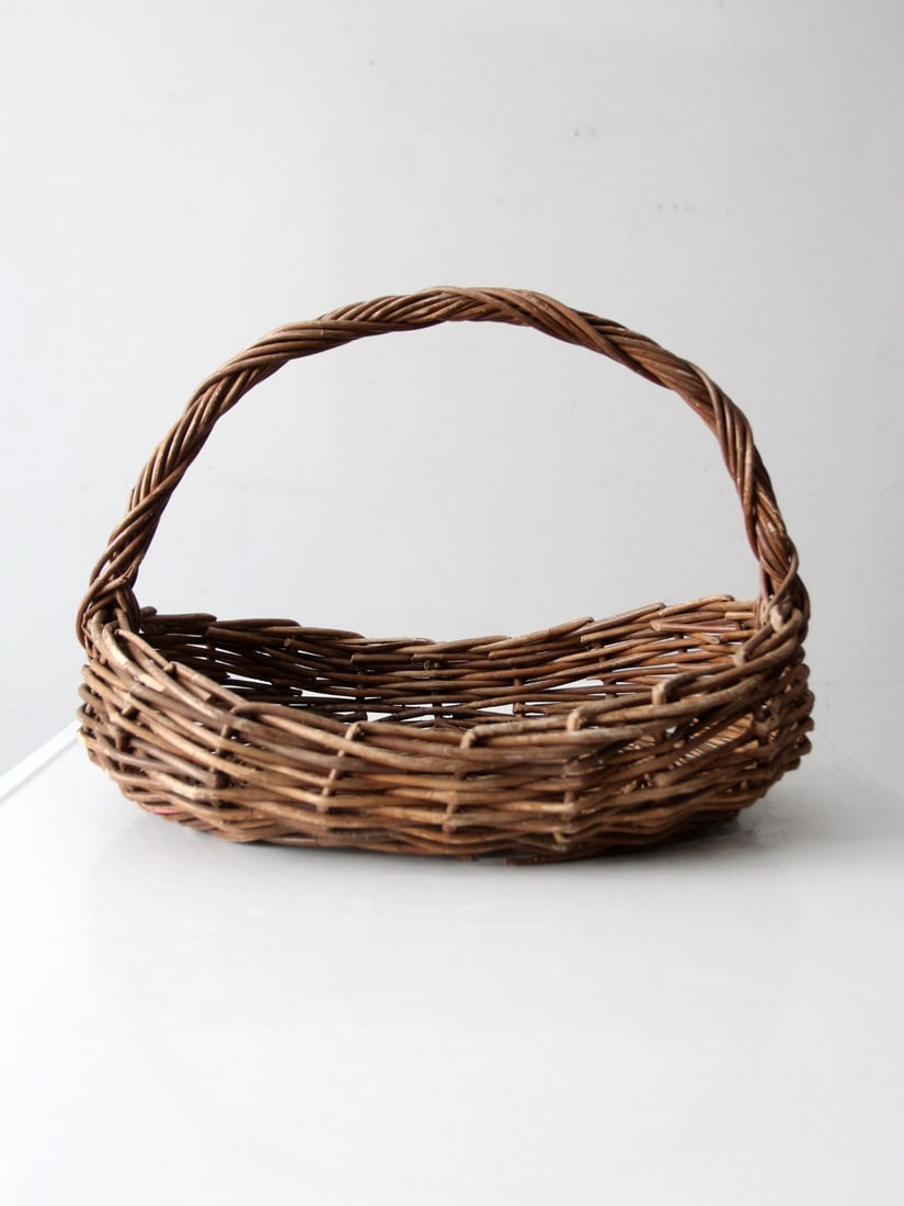 Handmade Twisted Handle Wicker Basket with Natural Woven Texture (1 of 12)