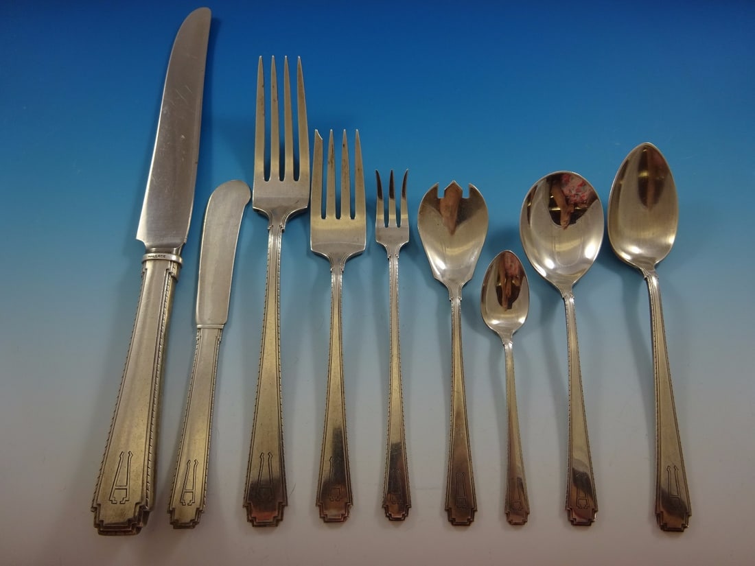 Wallace Rhythm Sterling Silver 109 Piece Flatware Set with H Monogram: Wallace Rhythm Sterling Silver 109 Piece Flatware Set with H Monogram Discover the elegance of the "Rhythm" flatware set by Wallace, crafted from sterling silver and embodying the Art Deco style from
