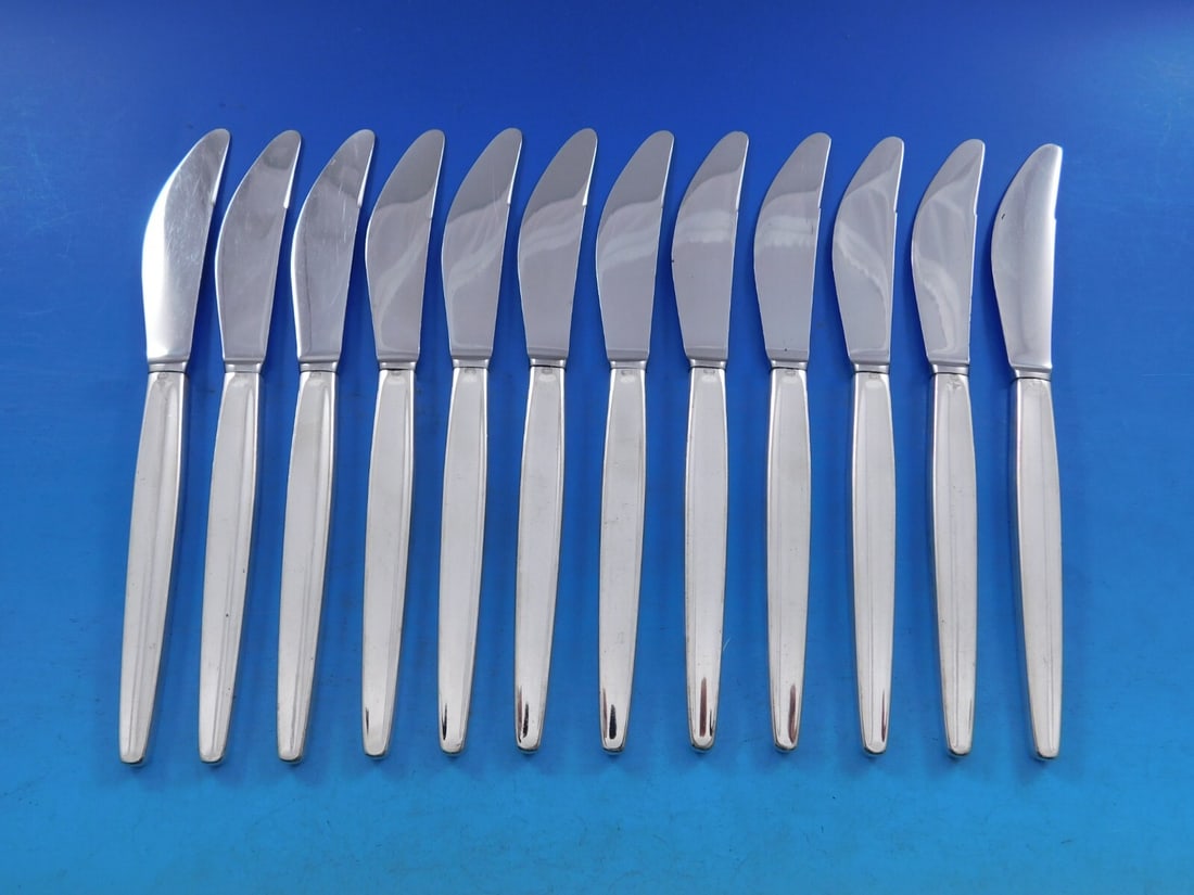 Georg Jensen Cypress Sterling Silver Butter Spreader Set 12pc: Georg Jensen Cypress Sterling Silver Butter Spreader Set 12pc This exquisite set features 12 butter spreaders in the elegant Cypress pattern by Georg Jensen. Each spreader has a hollow handle crafted