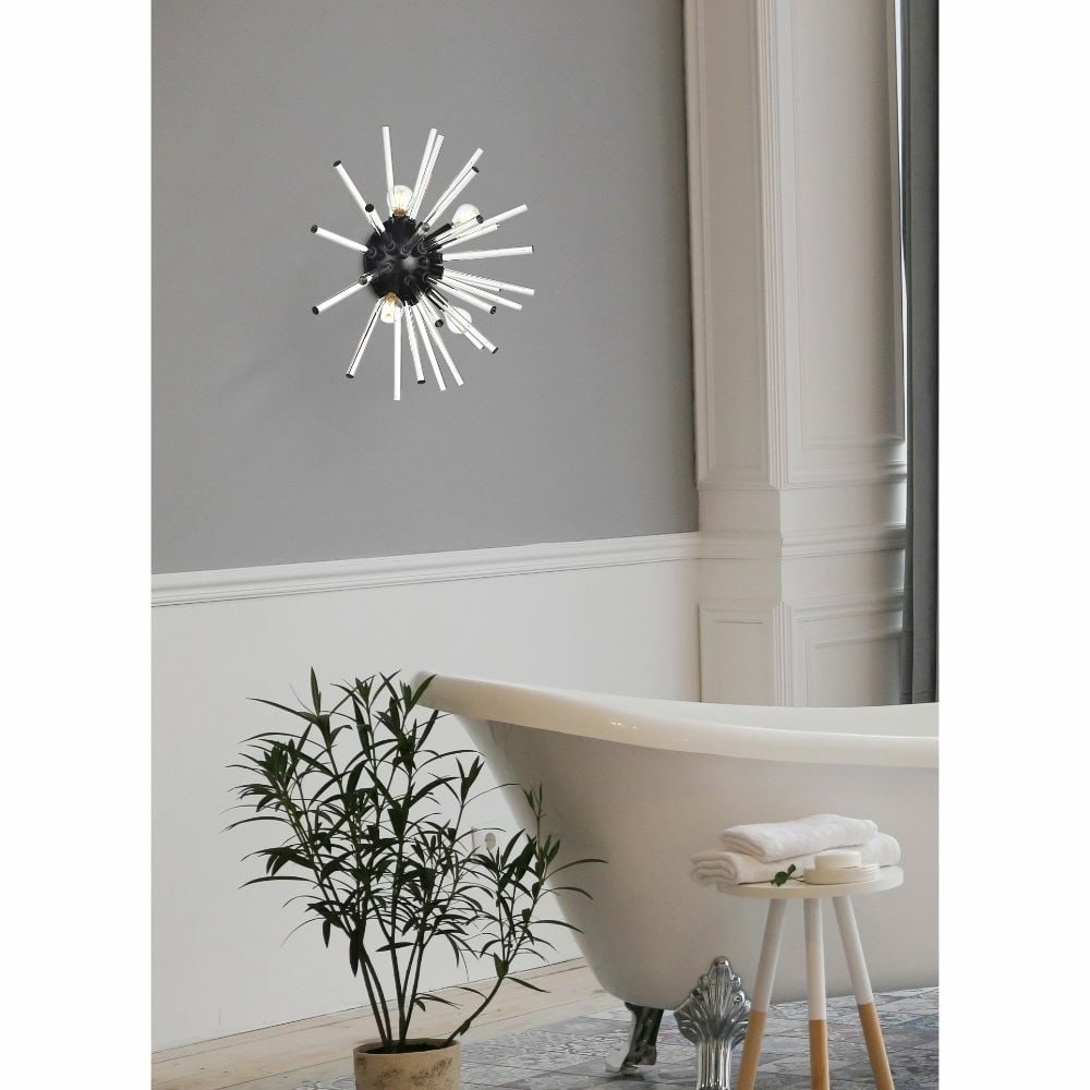 Sienna 18 Inch Modern Black Wall Sconce with Clear Glass Rods and Four Lights: Sienna 18 Inch Modern Black Wall Sconce with Clear Glass Rods and Four Lights This modern Sputnik-style wall sconce features a black metal frame with clear glass rods, creating a striking and contempo