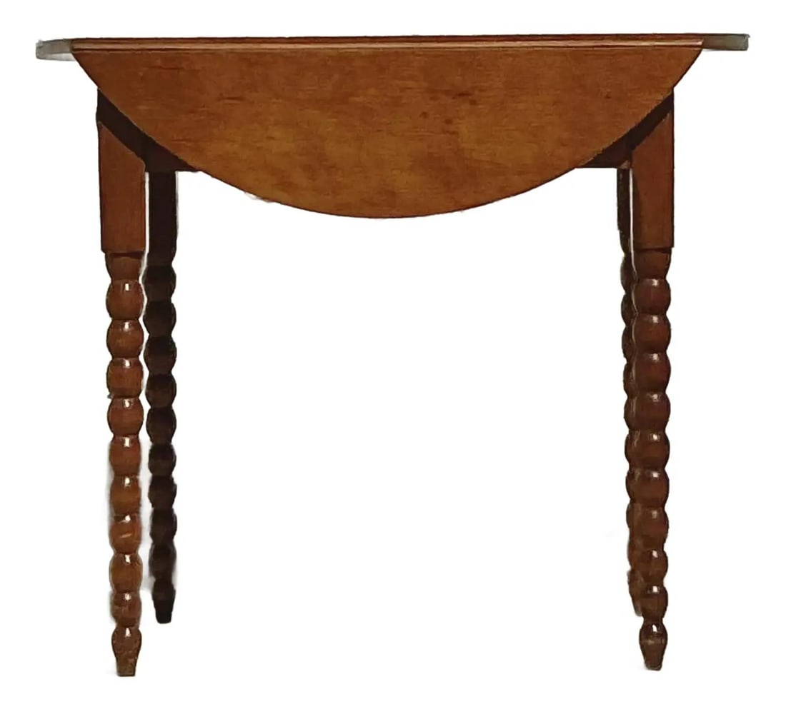 Vintage Bobbin Side Table with Drop-Leaf Design in Chocolate Wood: Vintage Bobbin Side Table with Drop-Leaf Design in Chocolate Wood Enhance your home with this Vintage Traditional Bobbin Side Table, a perfect blend of timeless charm and classic craftsmanship. Featur
