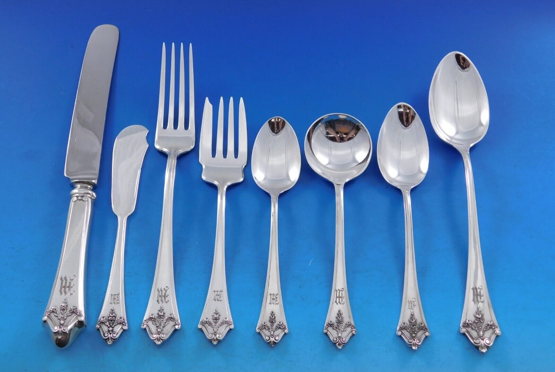 Lunt Orleans Sterling Silver Flatware Set for 12 - 109 Pieces with M Monogram: Lunt Orleans Sterling Silver Flatware Set for 12 - 109 Pieces with M Monogram Introducing the exquisite Orleans Sterling Silver Flatware Set by Lunt, a remarkable collection dating back to circa 1914.