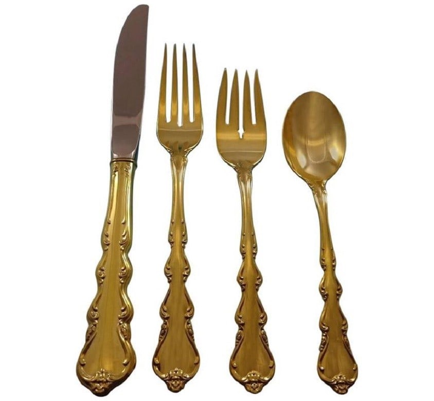 Angelique Gold Vermeil Flatware Set by International Silver 48 Pieces: Angelique Gold Vermeil Flatware Set by International Silver 48 Pieces Add elegance to your dining experience with the Angelique Gold Flatware Service Set by International Sterling Silver. This exquisi