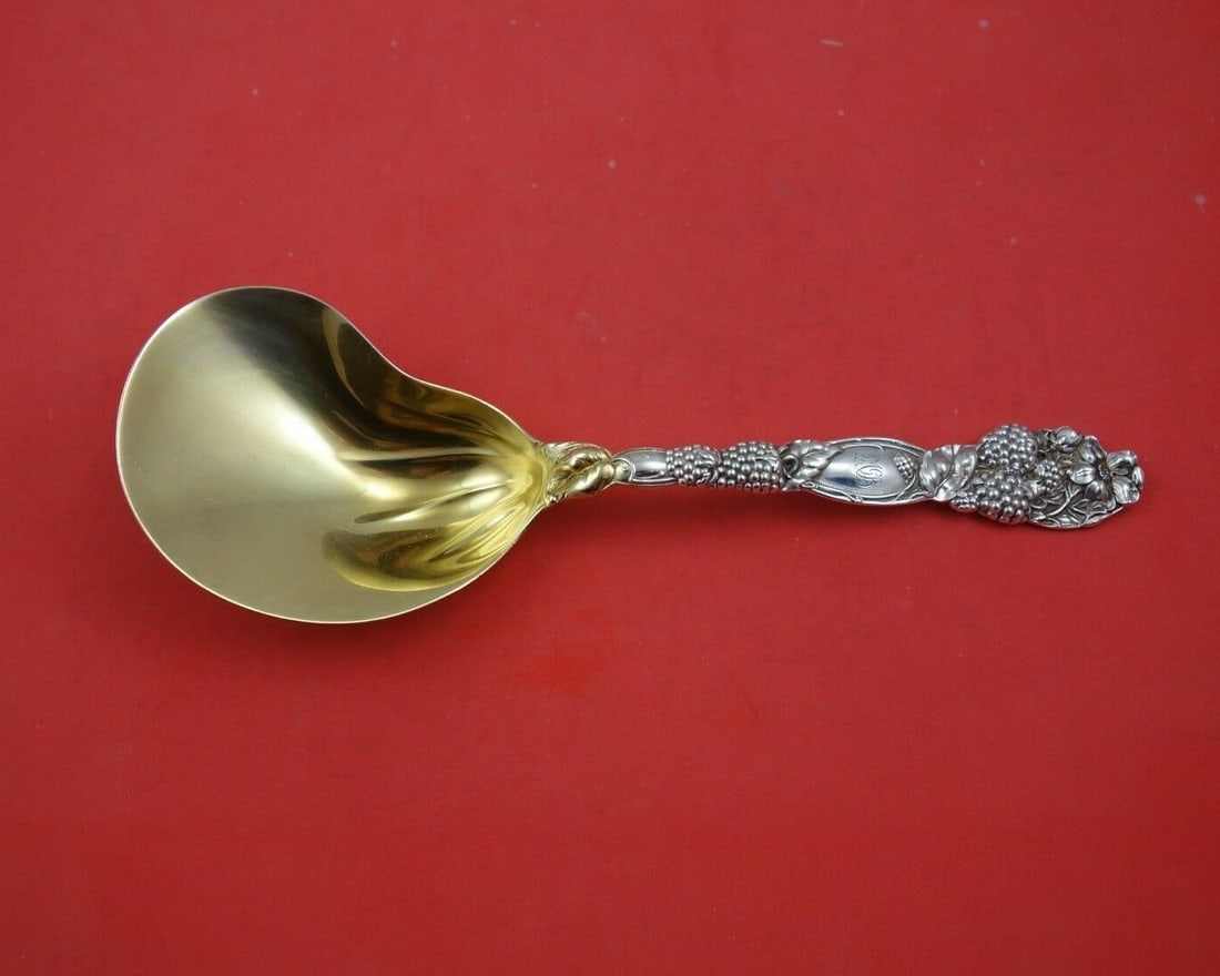 Tiffany & Co Blackberry Sterling Silver Conch Spoon 9.5" Gold Wash: Tiffany & Co Blackberry Sterling Silver Conch Spoon 9.5" Gold Wash This exquisite serving spoon from Tiffany & Co. features the iconic Blackberry pattern, showcasing a beautiful conch shape. Made from