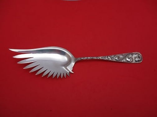 Durgin Scroll Sterling Silver Macaroni Server 10 5/8 Inch: Durgin Scroll Sterling Silver Macaroni Server 10 5/8 Inch This exquisite macaroni server, crafted by Durgin, features the elegant Scroll pattern in fine sterling silver. Measuring 10 5/8 inches, this