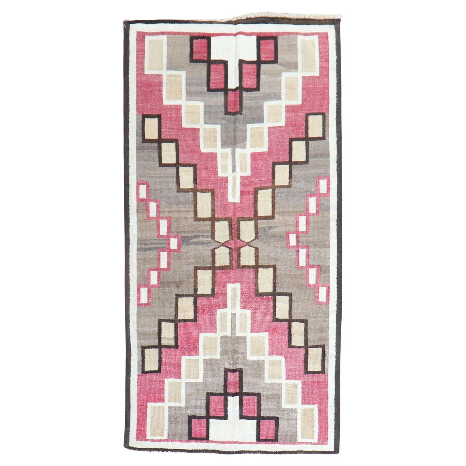 Antique Navajo Tribal Rug Hand-Woven Wool 1920s Geometric Design: Antique Navajo Tribal Rug Hand-Woven Wool 1920s Geometric Design This stunning Antique American Navajo Tribal Rug showcases a rich geometric design, characterized by a harmonious blend of pink, cream,