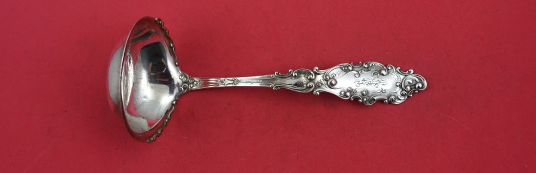 Gorham Luxembourg Sterling Silver Gravy Ladle 6.5" with Lacing: Gorham Luxembourg Sterling Silver Gravy Ladle 6.5" with Lacing Discover the elegance of the Luxembourg pattern by Gorham with this exquisite sterling silver gravy ladle. Measuring 6 1/2 inches, this l