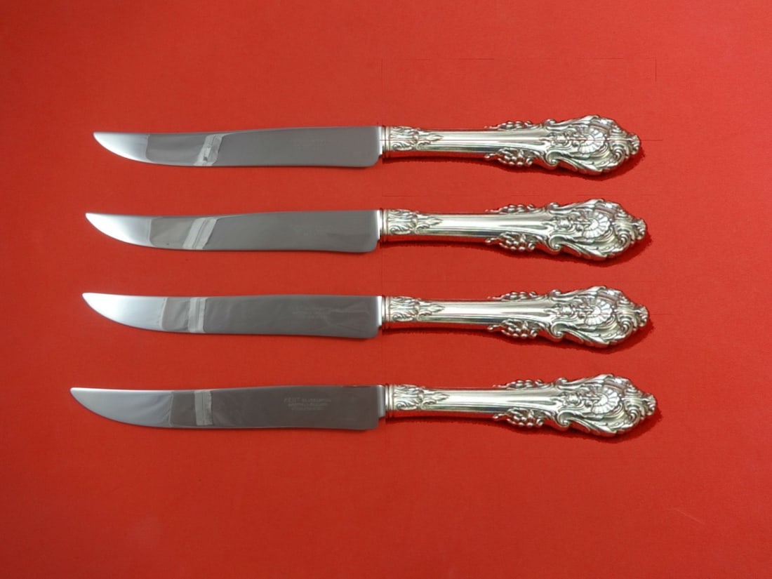 Wallace Sir Christopher Sterling Silver Texas Sized Steak Knife Set 4pc: Wallace Sir Christopher Sterling Silver Texas Sized Steak Knife Set 4pc Elevate your dining experience with this stunning 4-piece steak knife set from the Sir Christopher pattern by Wallace. Crafted f