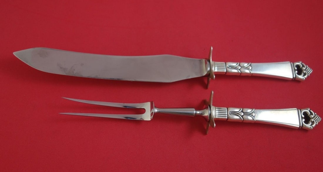 Frigast Danish Crown Sterling Silver 2-Piece Carving Set: Frigast Danish Crown Sterling Silver 2-Piece Carving Set Elevate your dining experience with this exquisite 2-piece roast carving set from the renowned Danish Crown pattern by Frigast. Crafted from st