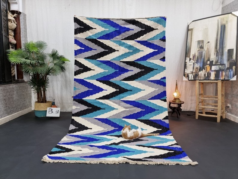 Authentic Handmade Moroccan Berber Wool Area Rug 6.56 x 3.28 Feet: Authentic Handmade Moroccan Berber Wool Area Rug 6.56 x 3.28 Feet Discover the beauty of this fabulous authentic handmade Moroccan Berber wool area rug. Crafted by local Berber women weavers in the At