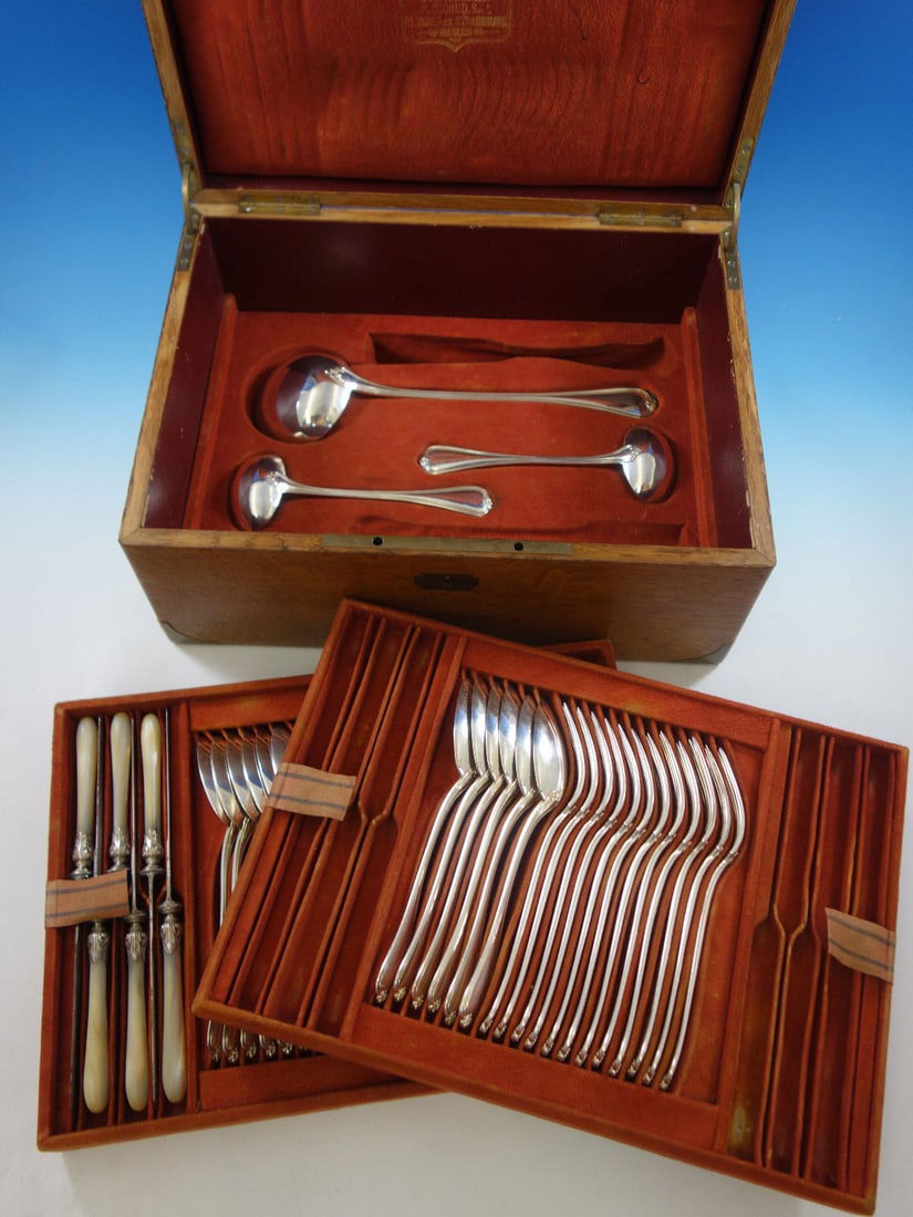 Antique French Sterling Silver Flatware Set by Francois Nicoud 51 Pcs: Antique French Sterling Silver Flatware Set by Francois Nicoud 51 Pcs Discover this exquisite French Sterling Silver Flatware Set by Francois Nicoud, crafted circa 1870. This remarkable collection com