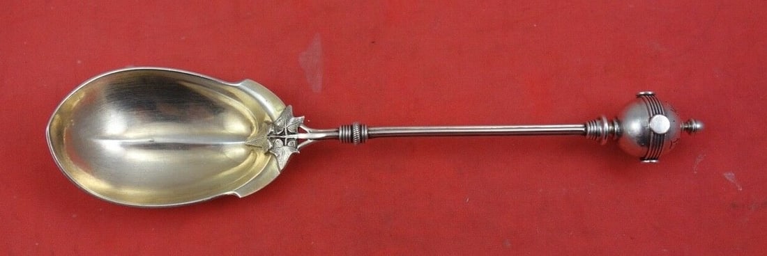 Gorham Ball Sterling Silver Sugar Spoon Gold Wash 6 3/8": Gorham Ball Sterling Silver Sugar Spoon Gold Wash 6 3/8" This exquisite sugar spoon, crafted by Gorham, showcases the elegant "Ball" pattern, a hallmark of fine sterling silver artistry. Measuring 6 3