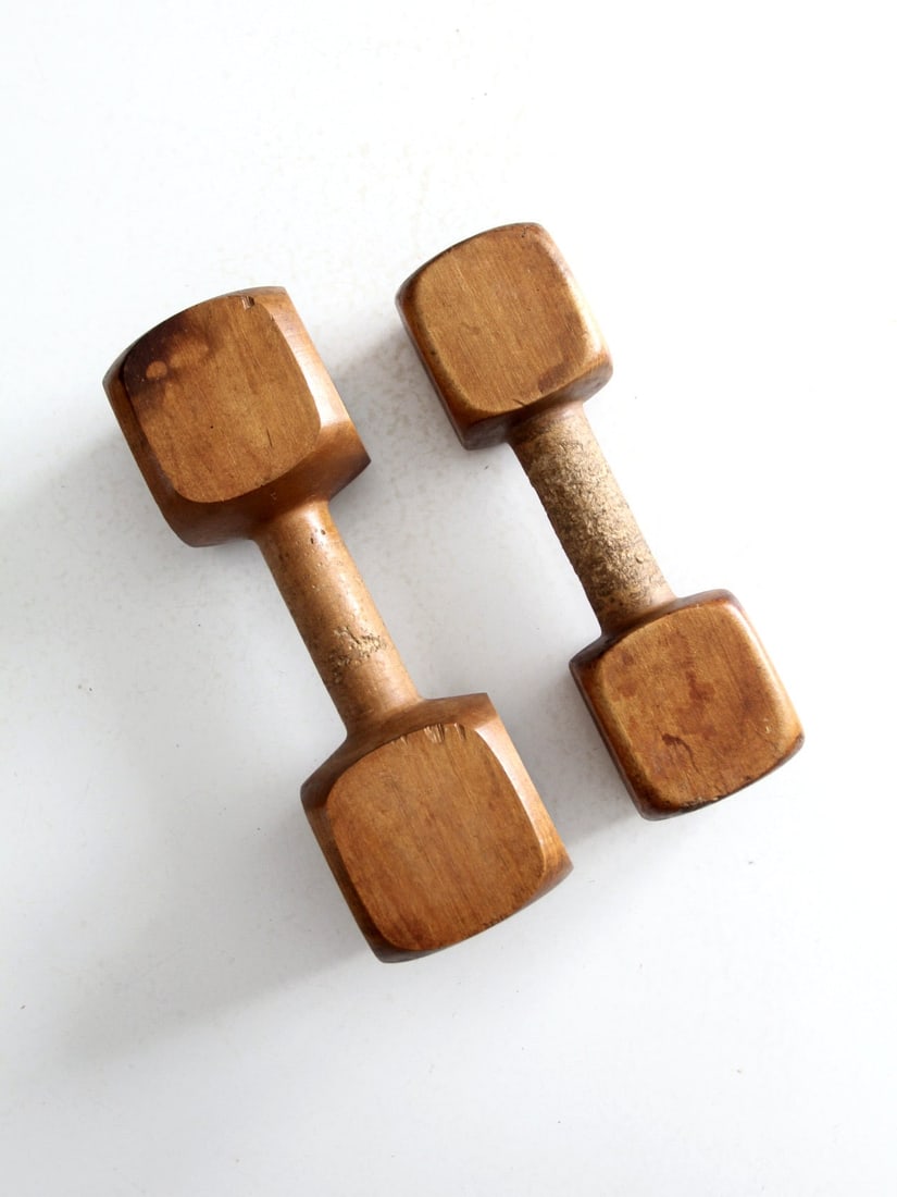 Vintage Wooden Hand Weights Set 1 LB 2 LB Maker Signed: Vintage Wooden Hand Weights Set 1 LB 2 LB Maker Signed This pair of vintage wooden hand weights features a unique design with squared ends, perfect for adding a touch of nostalgia to your workout. The