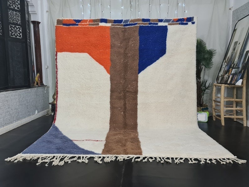 Artistic Handmade Moroccan Berber Wool Rug 9.84 x 6.56 Feet: Artistic Handmade Moroccan Berber Wool Rug 9.84 x 6.56 Feet Experience the charm of Moroccan craftsmanship with this stunning, handmade Berber wool area rug. Skillfully handwoven by local Berber women