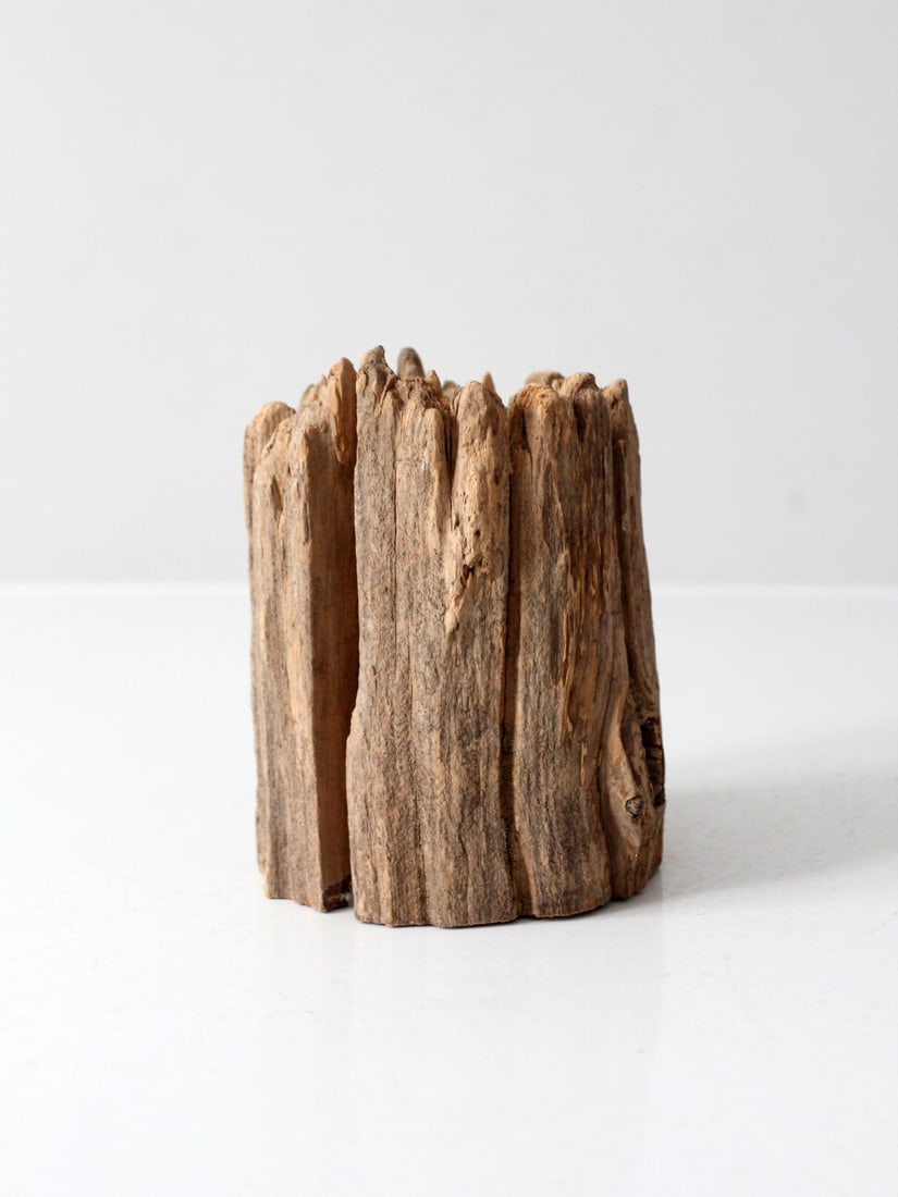 Rustic Vintage Wood Candle Holder for Pillar or Tea Light: Rustic Vintage Wood Candle Holder for Pillar or Tea Light This vintage rustic wood candle holder showcases a naturally weathered design, featuring a rugged silhouette with deep linear grooves and a ti