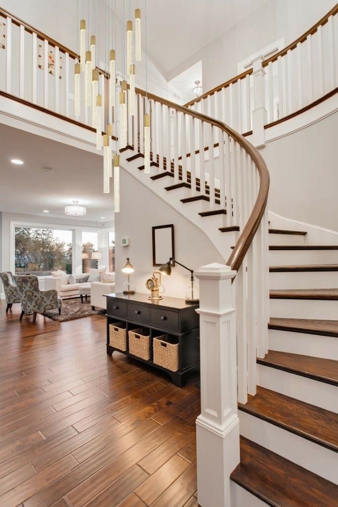 Weston Satin Gold 16-Light Crystal Pendant Chandelier by: Weston Satin Gold 16-Light Crystal Pendant Chandelier by Illuminate your space with this stunning Satin Gold Crystal Pendant Chandelier, featuring 16 lights that create a warm and inviting atmosphere.