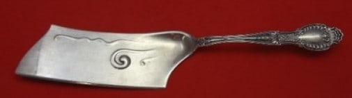 Tiffany & Co Richelieu Sterling Silver 12 Ice Cream Hatchet: Tiffany & Co Richelieu Sterling Silver 12 Ice Cream Hatchet Enhance your dessert experience with this exquisite 12" ice cream hatchet from Tiffany & Co., crafted in luxurious sterling silver. This pie