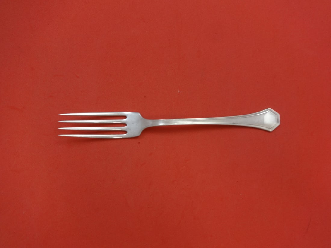 Reed and Barton Clovelly Sterling Silver Dinner Fork 7.5 inches: Reed and Barton Clovelly Sterling Silver Dinner Fork 7.5 inches This exquisite dinner fork is crafted from high-quality sterling silver and features the elegant Clovelly pattern by Reed & Barton, a re
