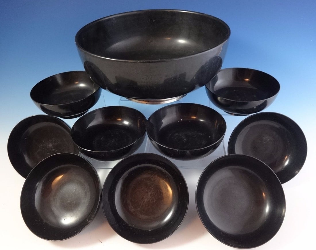 Towle Awakening Sterling Silver and Melamine Salad Bowl Set: Towle Awakening Sterling Silver and Melamine Salad Bowl Set Enhance your dining experience with the Awakening by Towle Sterling Silver Salad Bowl Set. This elegant mid-century set features a striking