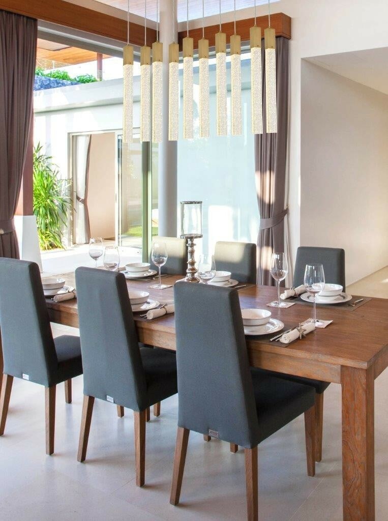 Satin Gold 10-Light Crystal Pendant Chandelier 42 in Weston Collection: Satin Gold 10-Light Crystal Pendant Chandelier 42 in Weston Collection Illuminate your space with this stunning Crystal Pendant Chandelier, featuring 10 lights that provide a brilliant glow. Designed