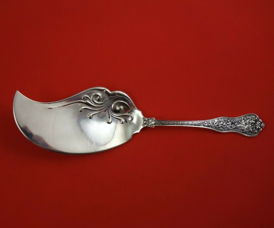 Tiffany & Co Olympian Sterling Silver Ice Cream Slice 11.25" Serving Piece: Tiffany & Co Olympian Sterling Silver Ice Cream Slice 11.25" Serving Piece Serve your desserts with a touch of elegance using this stunning ice cream slice from the Olympian pattern by Tiffany & Co. C