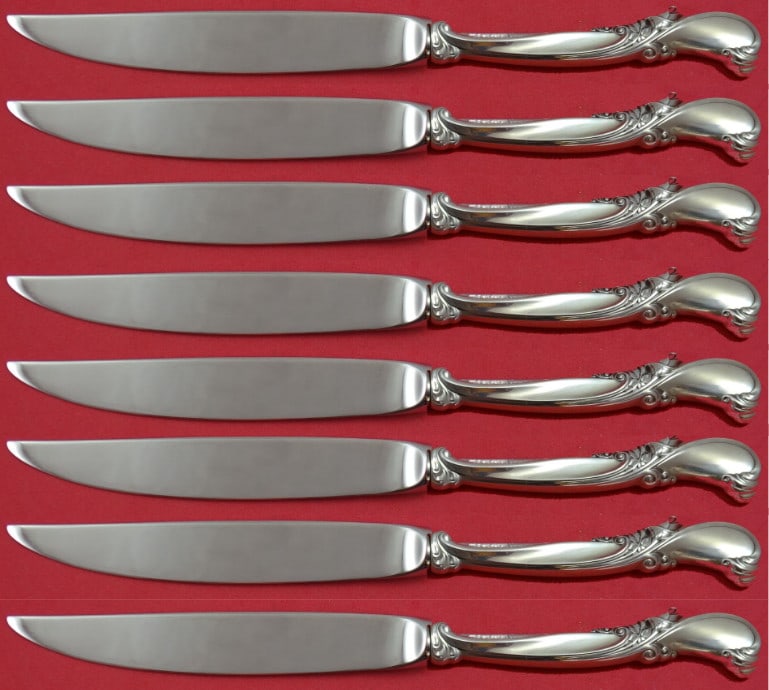 Wallace Waltz of Spring 8pc Sterling Silver Steak Knife Set Not Serrated: Wallace Waltz of Spring 8pc Sterling Silver Steak Knife Set Not Serrated Experience elegance with the Waltz of Spring by Wallace Sterling Silver Steak Knife Set. This exquisite set includes 8 hollow h