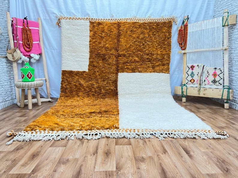 Authentic Moroccan Handwoven Soft Rug 100% Sheep Wool 8 x 5 Feet: Authentic Moroccan Handwoven Soft Rug 100% Sheep Wool 8 x 5 Feet Discover the beauty of an authentic handwoven soft rug, crafted by skilled Berber women weavers in the Atlas Mountains of Morocco. This
