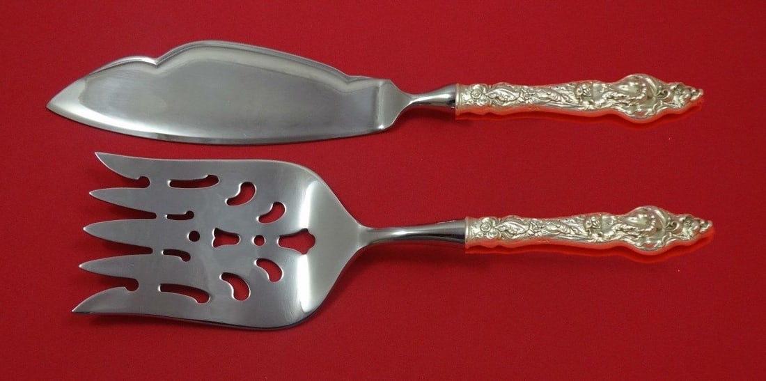 Reed & Barton Les Six Fleurs Sterling Silver Fish Serving Set: Reed & Barton Les Six Fleurs Sterling Silver Fish Serving Set Enhance your dining experience with this exquisite Les Six Fleurs Fish Serving Set by Reed & Barton. Crafted from sterling silver, this po