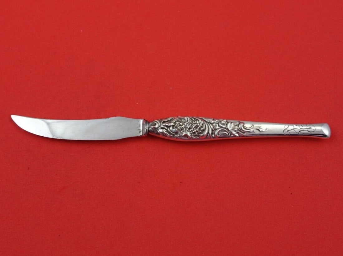 Shiebler 7511 Sterling Silver Fruit Knife Hollow Handle 6 3/4": Shiebler 7511 Sterling Silver Fruit Knife Hollow Handle 6 3/4" This exquisite fruit knife features a sterling silver hollow handle and a silverplate blade, crafted by the renowned maker Shiebler. The