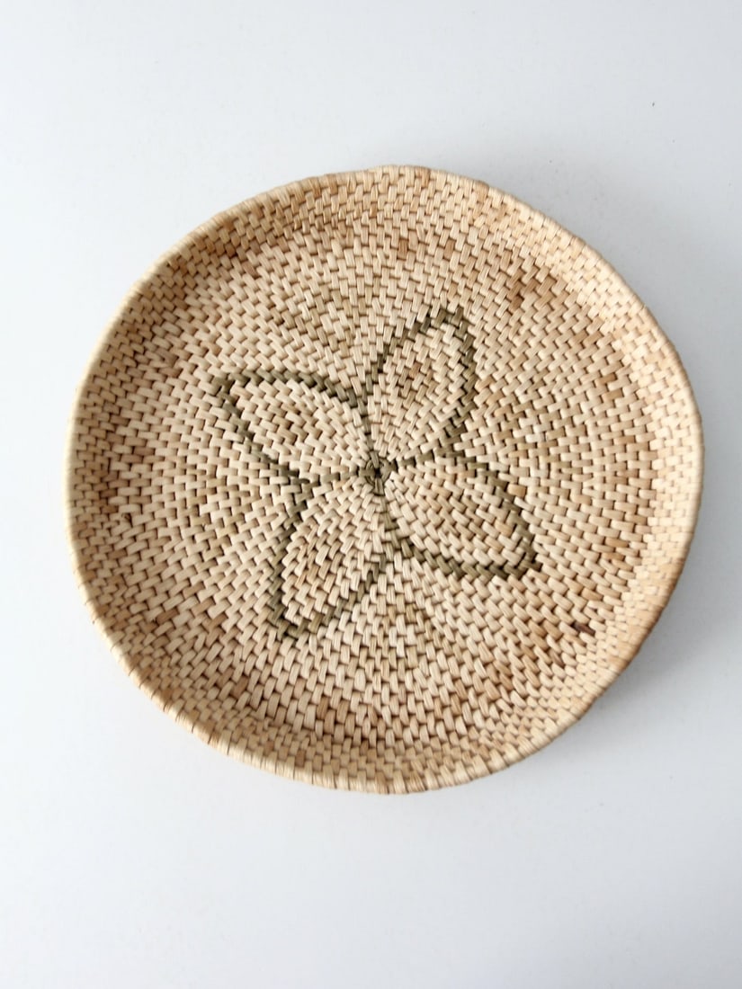 Boho Vintage Handwoven Basket Tray 15.25 Inch Decorative Accent: Boho Vintage Handwoven Basket Tray 15.25 Inch Decorative Accent Enhance your space with this Vintage Woven Basket Tray, showcasing a delightful boho charm. This handwoven tray is perfect for wall disp