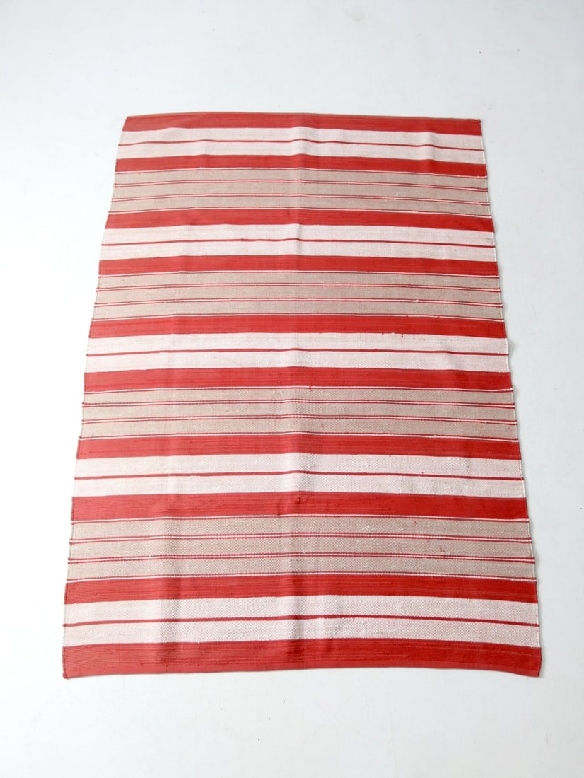 Vintage Woven Area Rug Red White Tan Stripes 98 x 67: Vintage Woven Area Rug Red White Tan Stripes 98 x 67 This vintage area rug showcases a captivating design with bold red, white, and tan stripes of varying widths, making it a versatile addition to any