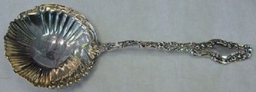 Durgin Watteau Sterling Silver Goldwashed Serving Spoon Not Pierced 8 7/8": Durgin Watteau Sterling Silver Goldwashed Serving Spoon Not Pierced 8 7/8" Enhance your table setting with this exquisite Watteau pattern serving spoon by Durgin. Crafted from high-quality sterling si