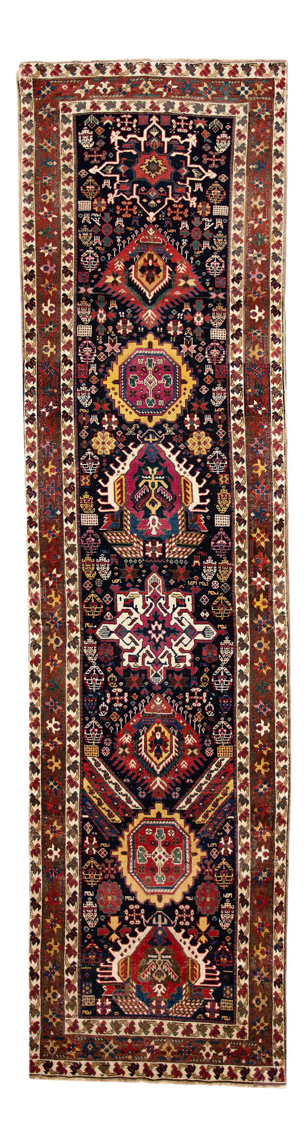 Antique Caucasian Kazak Blue Wool Runner 3'5 x 13'4 Multicolor Design: Antique Caucasian Kazak Blue Wool Runner 3'5 x 13'4 Multicolor Design This exquisite 20th century antique Caucasian Kazak runner is hand-knotted from high-quality wool, featuring a stunning blue field