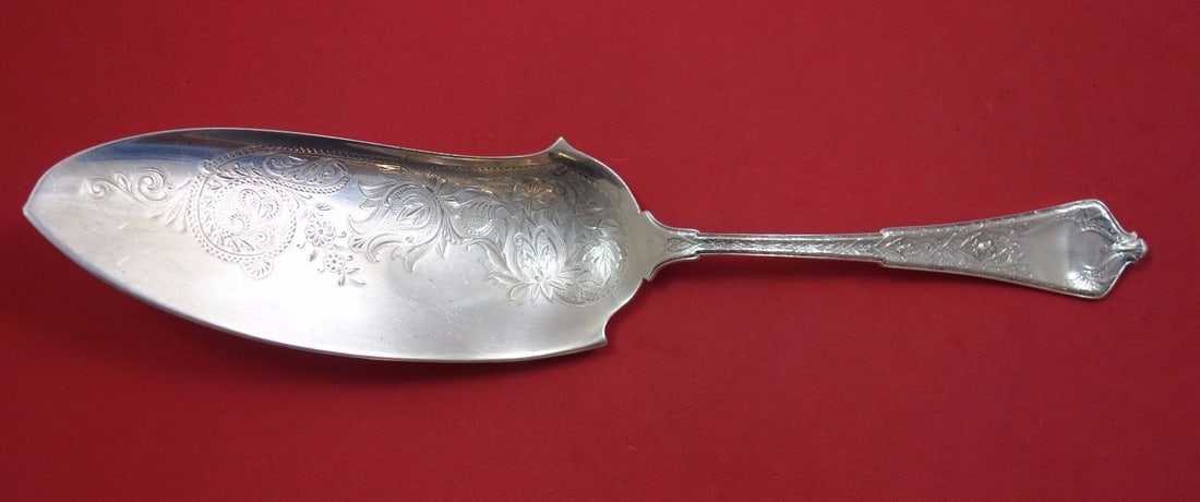 Tiffany & Co. Persian Sterling Silver Fish Server Bright-Cut 12.5 in: Tiffany & Co. Persian Sterling Silver Fish Server Bright-Cut 12.5 in This exquisite fish server from the renowned Persian pattern by Tiffany & Co. is a remarkable piece crafted from high-quality sterl