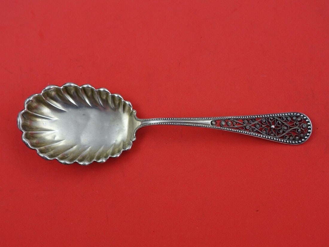 Dirksen Sterling Silver Preserve Spoon Filigree Handle A Fluted 7 1/4": Dirksen Sterling Silver Preserve Spoon Filigree Handle A Fluted 7 1/4" This exquisite preserve spoon features a beautifully crafted filigree handle and is made of high-quality sterling silver. Designe