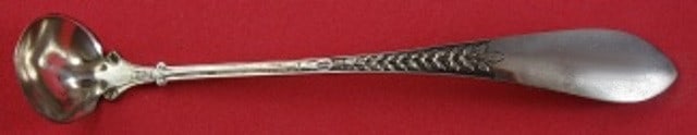 Gorham Palm Pattern Sterling Silver Gold Washed Mustard Ladle 5 1/4": Gorham Palm Pattern Sterling Silver Gold Washed Mustard Ladle 5 1/4" This exquisite mustard ladle, crafted by Gorham, features a classic Palm pattern and is made from sterling silver with a gold wash