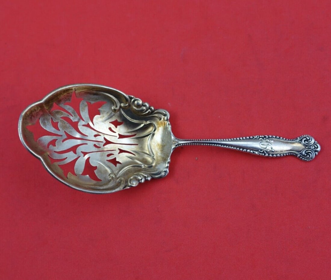 Towle Canterbury Sterling Silver Gold Washed Almond Scoop 5 Inch Serving Piece: Towle Canterbury Sterling Silver Gold Washed Almond Scoop 5 Inch Serving Piece Introducing the Canterbury by Towle Sterling Silver Almond Scoop, a beautifully crafted serving piece from the 1850-1899