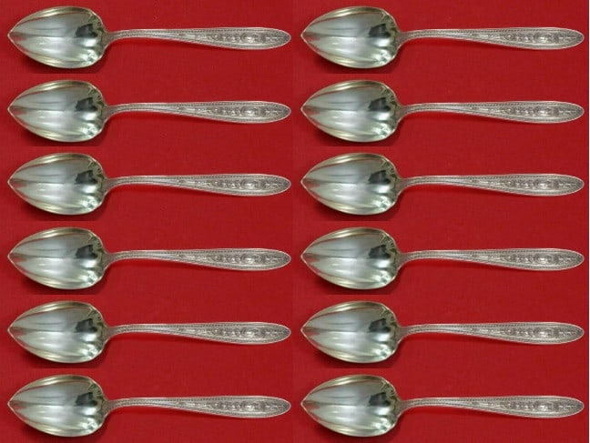 International Sterling Silver Wedgwood Grapefruit Spoon Set 12 pcs: International Sterling Silver Wedgwood Grapefruit Spoon Set 12 pcs This exquisite custom set of grapefruit spoons is crafted from high-quality sterling silver, featuring the elegant Wedgwood pattern b