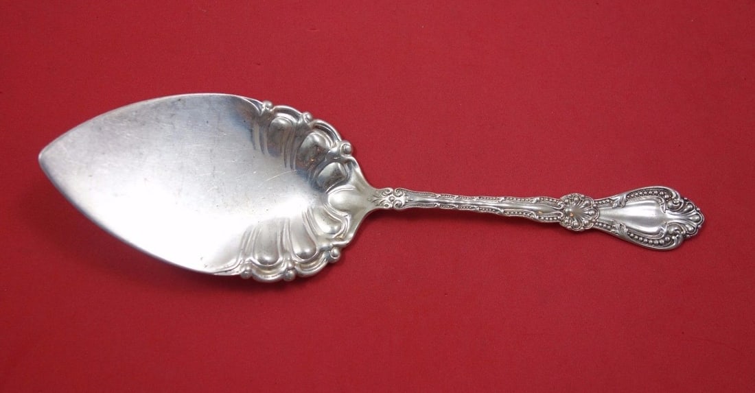 Alvin Orient Sterling Silver Pie Server Flat Handle 8 3/4 inches: Alvin Orient Sterling Silver Pie Server Flat Handle 8 3/4 inches This exquisite cake/pie server features the Orient pattern by Alvin, crafted from high-quality sterling silver. With a flat handle desi