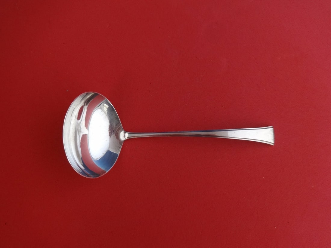 Tranquility Sterling Silver Gravy Ladle by International 6.5 inch: Tranquility Sterling Silver Gravy Ladle by International 6.5 inch This elegant gravy ladle is crafted from fine sterling silver and designed in the exquisite Tranquility pattern by International / Fin
