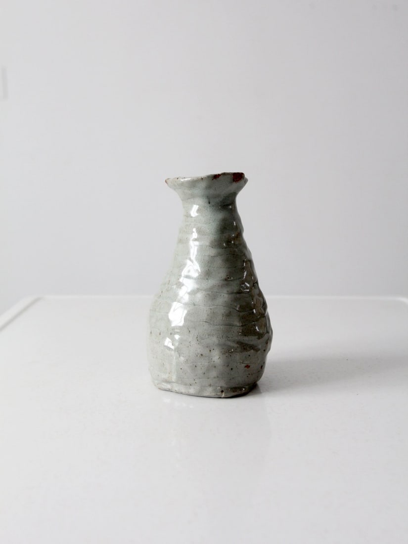 Handcrafted Vintage Studio Pottery Vase Blue-Gray Glaze 8 Inch: Handcrafted Vintage Studio Pottery Vase Blue-Gray Glaze 8 Inch This vintage studio pottery vase showcases an artistic design with its hand-crafted asymmetrical free-form shape and a beautiful blue-gra