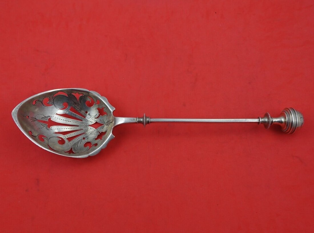 Wendt Sterling Silver Ball End Pattern #2 Slotted Ice Spoon 10": Wendt Sterling Silver Ball End Pattern #2 Slotted Ice Spoon 10" This exquisite sterling silver ice spoon features the elegant Ball End Pattern #2 by Wendt. Measuring 10 inches, it showcases a bright-c