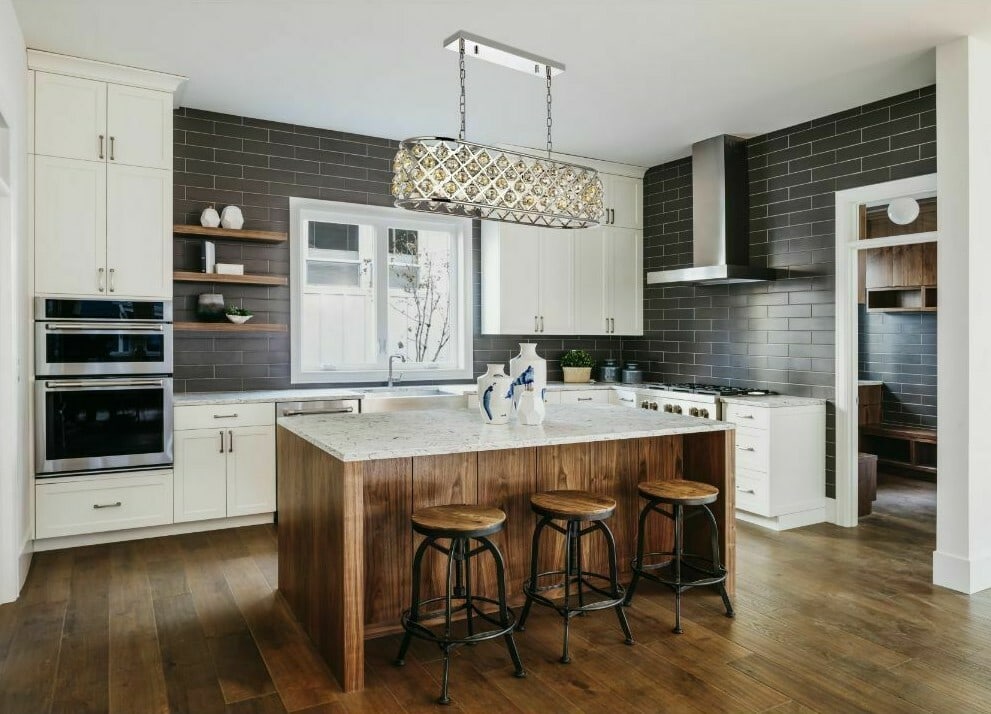 Madison 7 Light Polished Nickel Chandelier with Golden Teak Crystal 50 Inch: Madison 7 Light Polished Nickel Chandelier with Golden Teak Crystal 50 Inch This modern chandelier features a polished nickel finish with a rectangular frame and faceted golden teak royal cut crystal