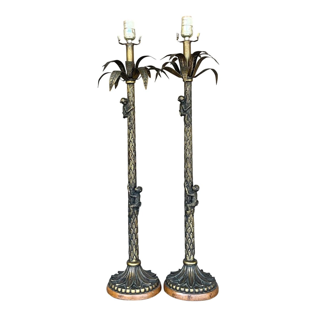 Vintage Brass Palm Tree Monkey Lamps Pair Coastal Decor: Vintage Brass Palm Tree Monkey Lamps Pair Coastal Decor This stunning pair of vintage palm tree and monkey lamps brings a lively coastal charm to any decor. Crafted from brass, these lamps showcase a