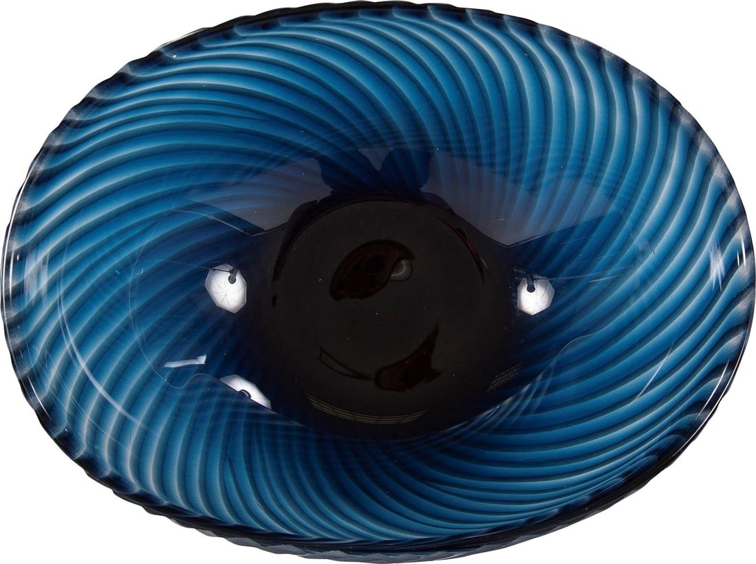 Howard Elliott Oceanic Wave Blue Hand-Blown Glass Bowl 11.5" Wide: Howard Elliott Oceanic Wave Blue Hand-Blown Glass Bowl 11.5" Wide This captivating blue glass bowl is inspired by ocean waves, showcasing a stunning hand-blown striped design. Perfect for adding a tou