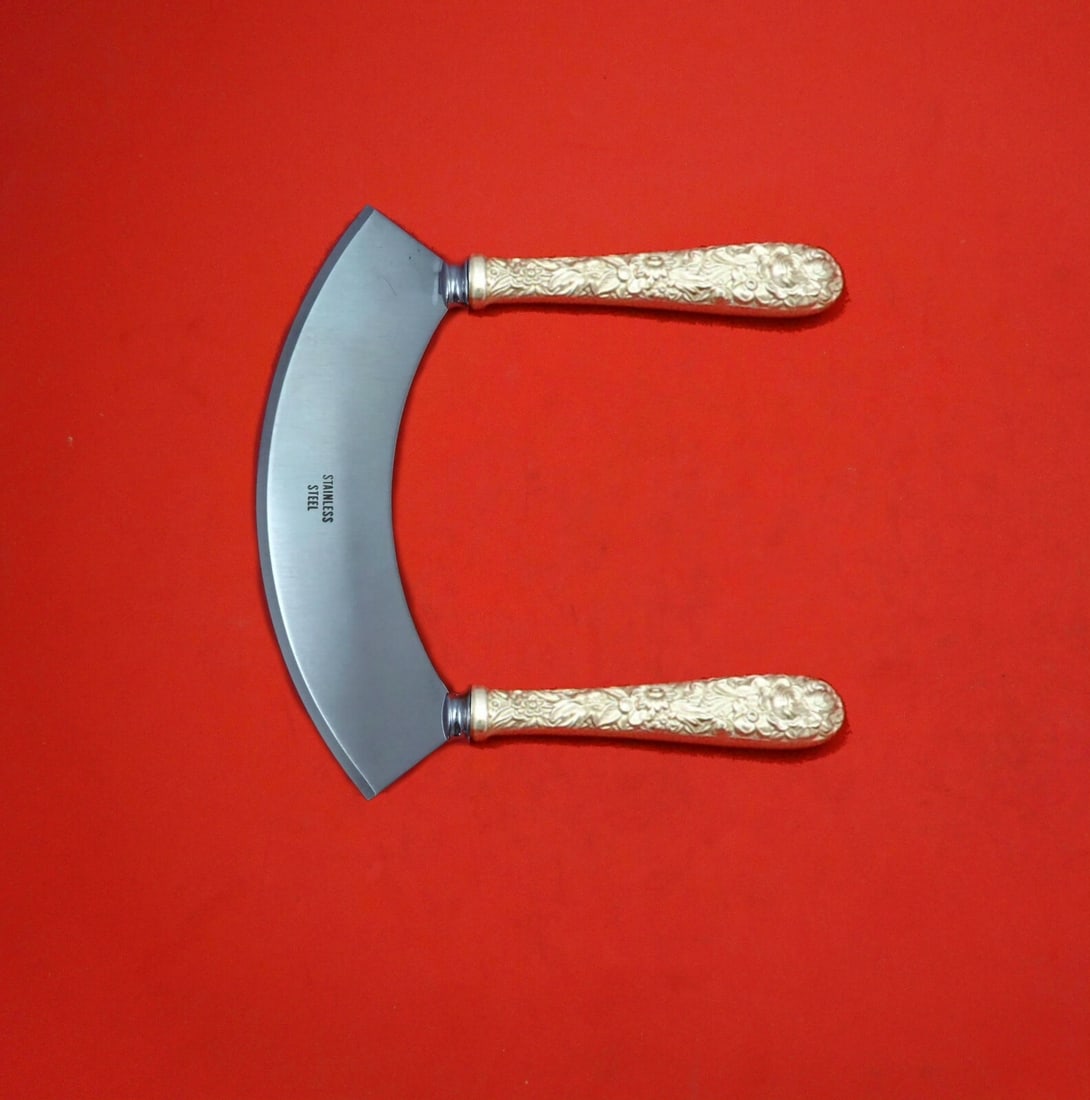 Kirk Sterling Silver Repousse Mezzaluna Knife Custom 6 1/4": Kirk Sterling Silver Repousse Mezzaluna Knife Custom 6 1/4" Discover the elegance of this custom-made mezzaluna knife by Kirk, crafted from high-quality sterling silver. Designed in the classic Repous